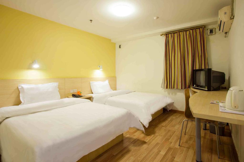 7Days Inn Chongqing Jiefangbei Jiaochangkou Subway Station Phòng bức ảnh